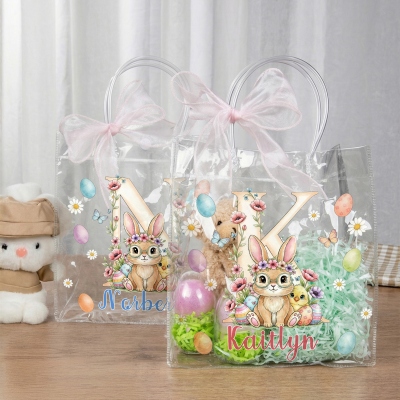 Personalisierte Ostergeschenktasche mit Namen, Blumenmuster, Hasenmotiv und rosa Schleife, durchsichtige PVC-Ostereiersuche-Tasche, Ostergeschenk für Kinder/Mädchen/Jungen